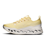 On Cloudsurfer Max women's road running shoes in gray and white, featuring cushioned sole and breathable mesh upper.
