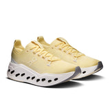 Women's On Cloudsurfer Max road running shoes in black and white with cushioned design and breathable mesh upper.