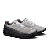 Men's On Cloudmonster Void active life sneakers in black with cloud-like design and breathable mesh upper.