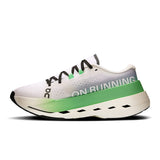 Women's On Cloudboom Max road running shoes with breathable mesh upper and cushioned sole, designed for performance.