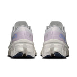 Women's On Cloudmonster 3 road running shoes with grey and white design, featuring cushioned soles and breathable mesh uppers.