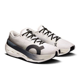Men's On Cloudboom Max road running shoes in black with white accents, featuring breathable mesh upper and cushioned sole.