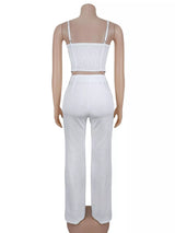 Decorative button smocked back cami and wide-leg pants set by Trendsi, featuring stylish design and comfortable fit.
