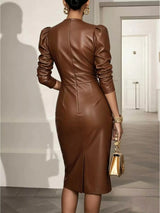 V-neck puff sleeve midi dress by Trendsi featuring a fitted waist and flowing skirt, perfect for elegant daytime or evening wear.