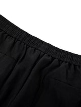 Men's wide-leg drawstring pants by Trendsi, featuring a relaxed fit, lightweight fabric, and adjustable waistband, shown on a model.