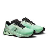 On Cloudpulse Pro women's training shoes in black with white accents, featuring breathable mesh and cushioned soles.