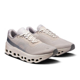 Men's On Cloudmonster 1 active life sneakers with gray and blue design, featuring cushioned sole and breathable mesh upper.