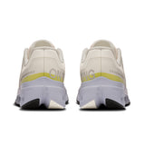 On Cloudsurfer Next women's road running shoes in black and white with cushioned soles, designed for comfort and performance.