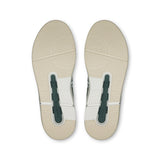 On THE ROGER Clubhouse men's tennis shoes in gray with white accents, featuring breathable mesh and durable rubber soles.