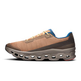 Men's On Cloudmonster Void limited edition running shoes in ivory and dust with active life design.