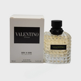Valentino DONNA Born In Roma Yellow Dream perfume bottle with yellow and gold design, showcasing a luxurious and elegant fragrance.