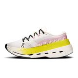 Women's On Cloudboom Max road running shoe with breathable mesh upper and cushioned sole, designed for performance and comfort.