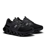 Women's On Cloudswift Amp active lifestyle sneakers in black with white accents, showcasing the lightweight running shoe design.