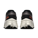 On Cloudmonster 3 women's road running shoes with cushioned soles and sleek design, ideal for comfortable running.