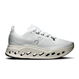 Women's On Cloudsurfer Max road running shoes in black and white with cushioned soles and sleek design.