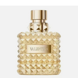 Valentino Born in Roma The Gold Donna perfume bottle with gold accents and elegant design on a white background