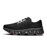 Men's On Cloudmonster 3 road running shoes in black and eclipse, limited edition design with cloud cushioning and durable outsole.