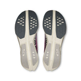 Men's On Cloudboom Strike road running shoes with breathable mesh upper and cushioned sole, designed for speed and comfort.