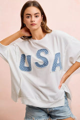 French Terry top with patriotic USA letter patchwork and 4th of July design, from Trendsi, featuring colorful USA-themed embroidery.