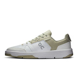 On THE ROGER Clubhouse men's tennis shoes with white and black design, featuring breathable mesh and cushioned sole for comfort.