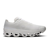 Men's On Cloudmonster Void active life sneakers with black and gray design, showcasing the athletic shoe's details and supportive sole.