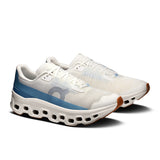 On Cloudmonster Void men's limited edition active lifestyle shoes in ivory and dust, shown with side view and textured sole.