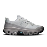Women's On Cloudrock Low Waterproof hiking shoes with black and gray design, featuring durable waterproof material and rugged soles.