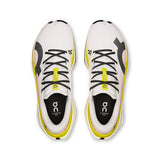 Men's On Cloudboom Max road running shoes in black and white with cushioned soles and breathable mesh upper.