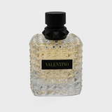 Valentino DONNA Born In Roma Yellow Dream perfume bottle with bright yellow label and elegant design.