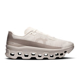 On Cloudmonster Void women's active life shoes in pearl and desert, showcasing the limited edition design and sporty style.
