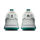On THE ROGER Clubhouse Pro 2 men's tennis shoes in white and blue with cushioned soles and breathable mesh uppers.