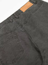 Men's vintage washed cargo pants by Trendsi, showing relaxed fit with multiple utility pockets and faded denim texture.