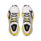 Women's On Cloudboom Max road running shoes with breathable mesh upper and cushioned sole for comfortable running.