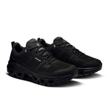Men's On Cloudrock Low Waterproof hiking shoes with rugged outsole and breathable upper for outdoor adventures.