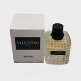 Valentino DONNA Born In Roma Yellow Dream fragrance bottle with vibrant yellow design and elegant branding.