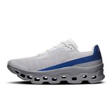 Men's On Cloudmonster Void active life sneakers with black and gray design, showcasing the cushioned sole and lightweight athletic style.