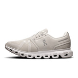 Women's On Cloud 6 running shoes in black and white with cloud-like cushioning and sleek athletic design.