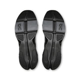 On Cloudpulse Next men's training shoes in black with mesh upper and cushioned sole, designed for active workouts.