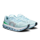 Women's On Cloudflow 5 road running shoes in white and blue, featuring lightweight design and cloud cushioning for comfort.