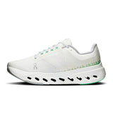 On Cloudsurfer Next women's road running shoes with cushioned soles and sleek design, suitable for comfortable running.