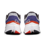 Men's On Cloudsurfer Next road running shoes in gray and blue, featuring lightweight design and cushioned soles for running comfort.