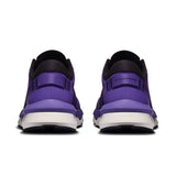 On Cloudzone women's active life shoes in black with white accents, featuring lightweight design and cushioned soles for running and gym.