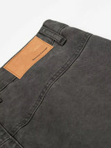 Men's vintage washed cargo pants in neutral tones, featuring multiple pockets and a relaxed fit, by Trendsi.