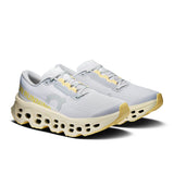 Women's On Cloudmonster 3 road running shoes with breathable mesh and cushioned soles, designed for comfort and performance.