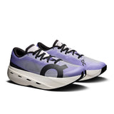 Women's On Cloudboom Volt road running shoes in black and white with sporty design and lightweight construction.