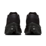 On Cloudmonster 3 women's road running shoes in black and white, featuring cushioned soles and breathable mesh upper.