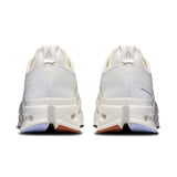 On Cloudsurfer Max women's road running shoes in ivory and Nimbus color, featuring On's cloud cushioning technology.