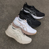 Women's ASICS GEL-Kayano 32 stability trainers in gray and teal, featuring cushioned soles and supportive design.
