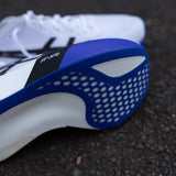 White and cobalt blue ASICS Metaspeed Sky Tokyo unisex road racing shoes with sleek design and lightweight construction.