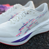 Women's ASICS Sonicblast Tokyo tempo trainers featuring a sleek design with blue and white accents and durable rubber soles.